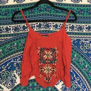 orangey red tribal embossed cropped tank